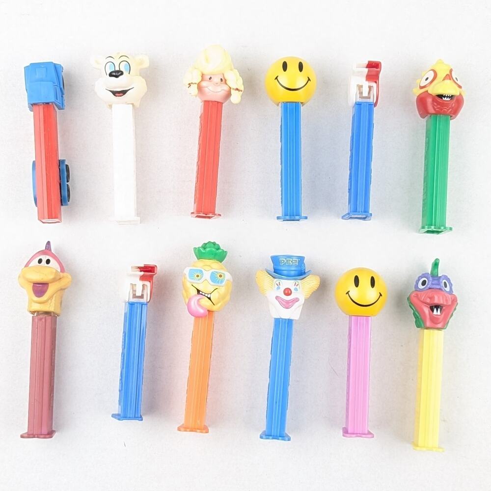 Vintage PEZ Dispenser Lot – 13 pc Mixed Characters incl Garfield 1970–2001